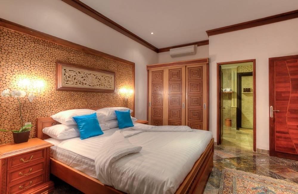 巴厘岛沙努尔海滩豪华海洋别墅卧室